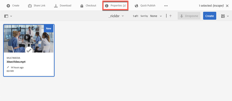 Selected video asset with checkmark over video thumbnail image and View Properties highlighted on the toolbar.